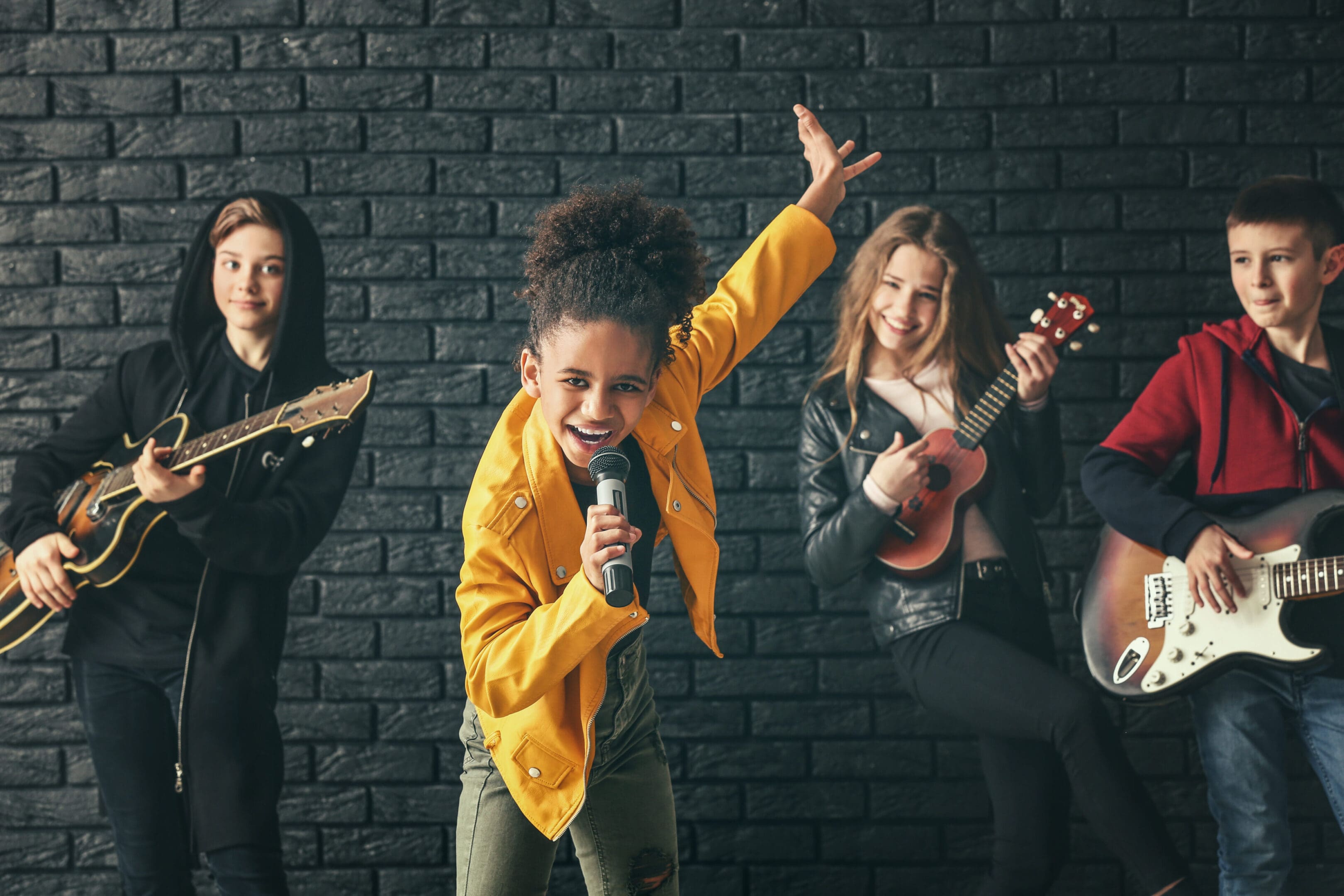 A group of people singing and playing instruments.