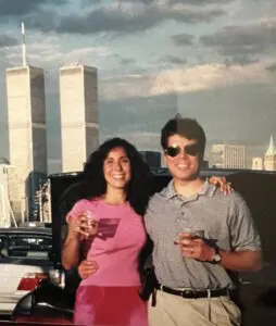 A man and woman standing next to each other.